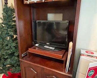 mahogany TV cabinet, albums, flat screen TV, stocking holders