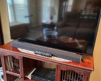 flat screen TV, entertainment cabinet,