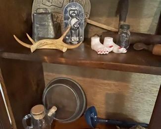 carved face on wood root, Martin Drug Store fan, enamel ladle, wood train whistles