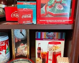 popcorn popper, more clocks, another telephone, more salt and pepper sets