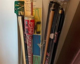 fishing rod and reel, cue sticks