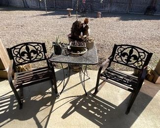 metal rockers, wrought iron patio table