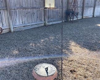 sundial, bird feeders, shepherd hooks