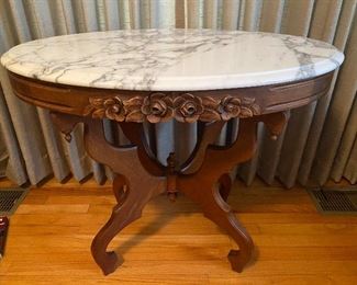Oval marble top Victorian center table