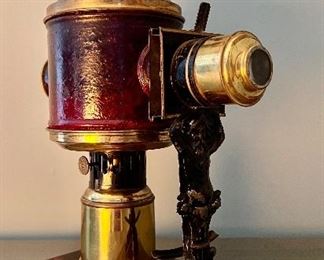 Magic Lantern - glass plates slide in and the images are projected onto the wall.