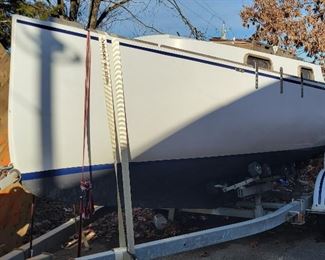 Lot 2 BLACKWATCH 24 Sail Boat
This boat is called the BLACKWATCH 24(overall length including the bowsprit is 24feet). Bluewater Boatworks (Dave Autry) the company that made this boat is located Amarillo Texas. An article in the October issue of “Sail” magazine states “This traditional-looking 24-foot trailer/sailer has some unique features…” Comment from Blackwatch Fleet “Dave Autry’s boats must be numbered among the rarest production boats ever manufactured. Dave’s company, Bluewater Boatworks of Amarillo, Texas, molded only 82 Blackwatch hulls between 1979 and 1981.”