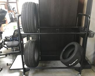 LOT 132 Large Tube 2 Tier Tire Rack &3 New Tires
Tire rack Measures: 72" x 62" 3 new tires Douglas Performance 235/45R18 2 Bridgestone's 235/50R19.
