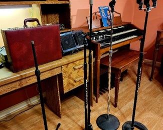 Assorted sound equipment including mic stands and receivers