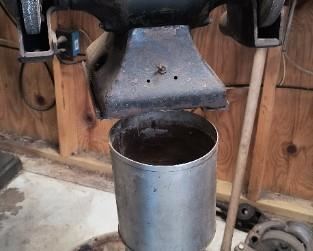 Very large grinder on massive base