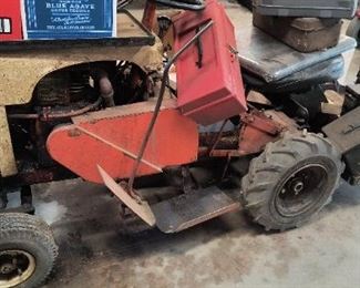 Vintage lawn mower with carryall