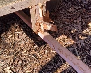 Tilt bed on small yard cart