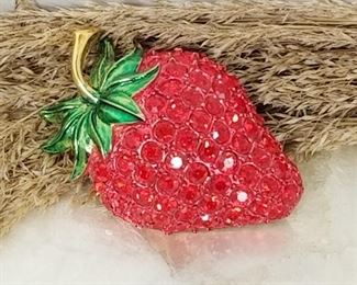 Strawberry brooch with red rhinestones and enameled stem