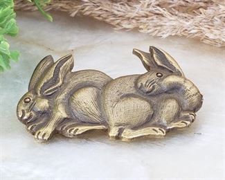 Brass Bunny pin by Peabody Essex Museum