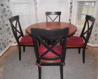Kitchen table with 4 chairs, round rug