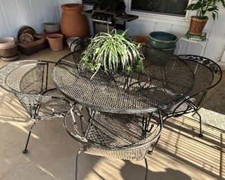 Wrought iron patio table and chairs 