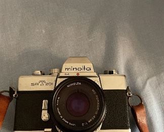 Minolta SRT201 film camera with case and strap