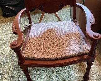 Old Office Chair
Old wooden office/desk chair with padded seat and back rest and has casters on the base
