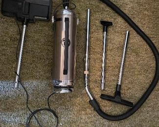Old style Vacum cleaner with all attachments.  
