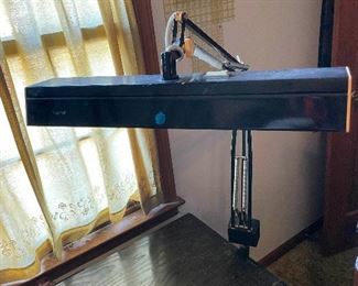 Work light for desk that clamps onto desk and can be adjusted to many different configurations.&nbsp;

