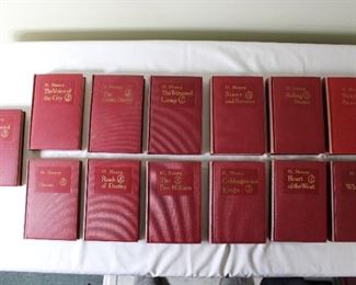 13 Volumes by O. Henry, Doubleday Doran, Red Covers, 1930's dates.  Each book 7 1/2” by 5”; 13 volumes 16 1/2” shelf space