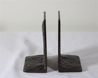 Early 20th Century Abraham Lincoln bronze bookends with Abe's profile on one piece and the conclusion of his 2nd Inaugural Speech on the other piece. Cast in solid bronze with maker's mark of Griffoul Foundry of Newark, NJ. Both pieces are adorned with an olive branch and the Speech piece also displays The Lamp of Knowledge. Designed and signed by M. Peinlich, originally sold through B. Altman, New York.  6 1/2” tall, 3 1/2” long, 4” wide.