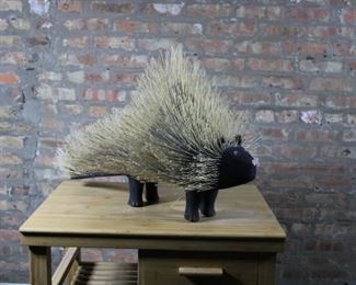 Large Carved Wood Sculpture of Porcupine, Overall length 32”, body length 27 1/2”, overall height 20 1/2”, overall depth 15 1/2”.