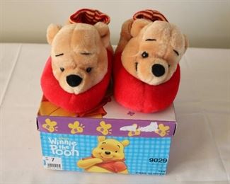 Disney Winnie the Pooh slippers, size 7.