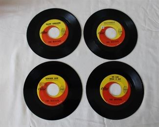 Four Beatles vinyl albums 45's