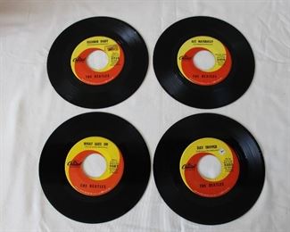 Four Beatles vinyl albums 45's