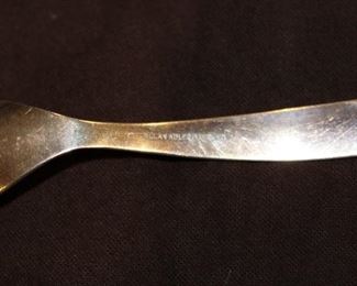 Alan Adler Sterling Silver Flatware, 94 pieces, plus one sugar spoon and plus one damaged teaspoon. 12 Each dinner knives, soup spoons, dinner forks, salad forks, butter knives, 23 teaspoons, 7 seafood forks, master butter knife, small fork, pastry/cake server, and long spoon.