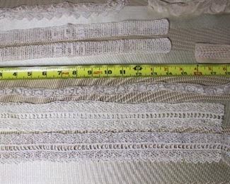 Another group lot that includes a variety of lovely antique lace trims and an antique V shaped collar