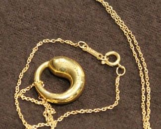 Mark on Tiffany & Co. 18K yellow gold chain and pendant designed by Italian Jewelry Designer Elsa Peretti