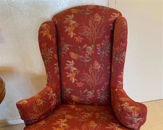 One of Two Upholstered Wing-Back Chairs