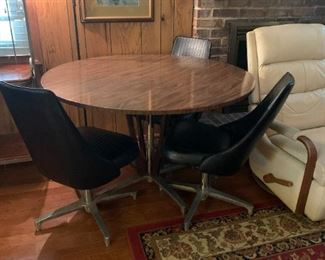 #34	Vintage chromcraft  Base Laminate Top Table w/3 ChromeCraft Black Vinyl Swivel Chairs - 48 Round x 30H	 $300.00 			
