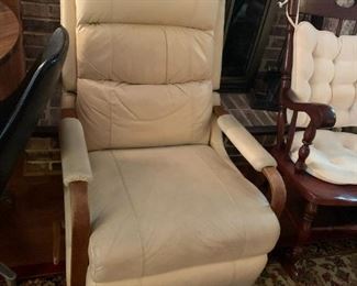 #35	Lazy-Boy Cream Leather Wood Arms Swivel Rocker Recliner  (as is leather - no tears)	 $125.00 			
