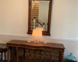 #47	Drexel Entry Table w/Smoked glass Back w/spindles - 60x15x29 and Matching Arch top  Mirror 27x53	 $175.00 			
