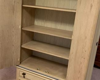#100	Bassett Armoire w/2 drawers & 3 shelves, 2 doors - 34x17x68	 $100.00 			
