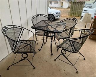 #106	Wrought Iron Table w/4 Springy Chairs - 28x29	 $106.00 			
