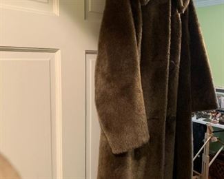 #149	Tudor City Brown Faux Fur Long Coat - small	 $40.00 			
