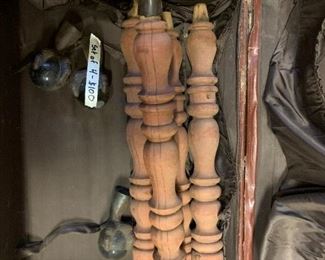 #157	4  glass ball and iron claw feet with 27 inch legs	 $100.00 			
