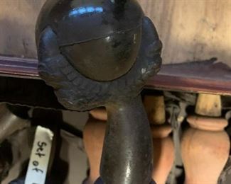 #157	4  glass ball and iron claw feet with 27 inch legs	 $100.00 			
