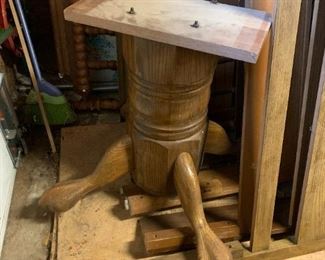 #163	project piece round oak pedistal table with 3 as is oak chairs  48 with protect glass top 	 $50.00 			
base of table