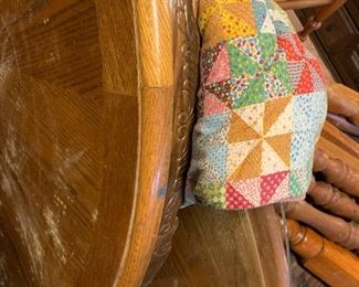 #163	project piece round oak pedistal table with 3 as is oak chairs  48 with protect glass top 	 $50.00 			
Top of table 