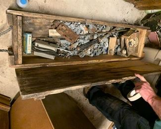 #166	47x12x9 wood crate with content 	 $55.00 			
