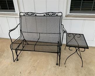 #186	black iron glider rocker loveseat with side table 	 $100.00 			
