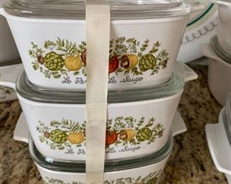 #204	Kitchen	corning ware 6 piece casserole with lids orange flower	 $24.00 			
