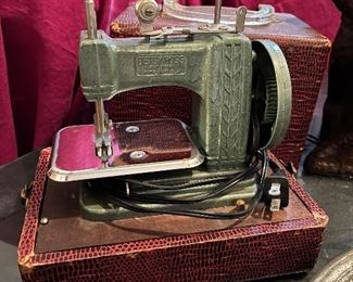 Vintage Betsy Ross electric sewing machine with case