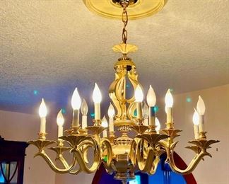 Polished and Brushed Brass Chandelier. Eight arms. Includes matching Sconces.  Approximately 30" diameter.