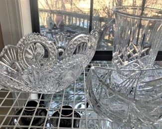 Pressed glass bowls and vases