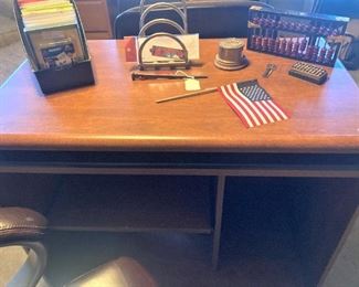 Small desk; small flag  .  .  .